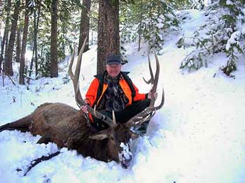 Hunter with Elk